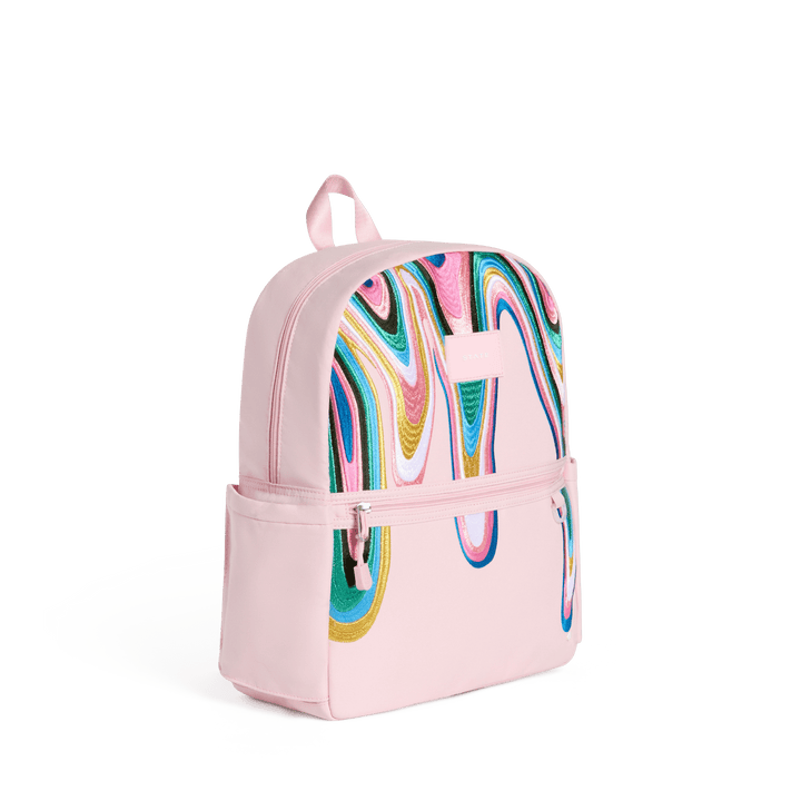 Pink Paint Wave Kane backpack at a three-quarter angle showing the side pocket