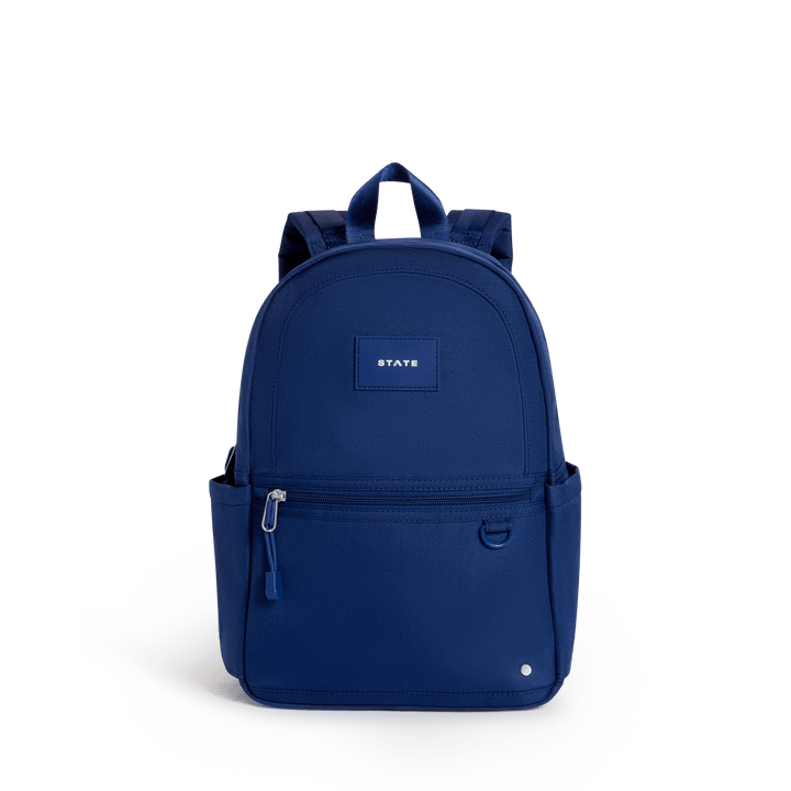 Solid navy STATE Kane Mini toddler backpack with small patch, front view