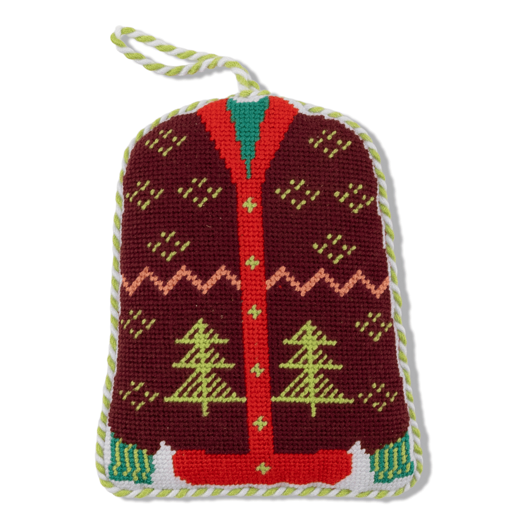 Burgundy Christmas cardigan needlepoint ornament with green trees, red placket, and cream cord, front view