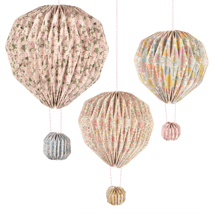 Meri Meri X Liberty Origami Balloon Decorations on white background, folded paper balloon shapes with Liberty print