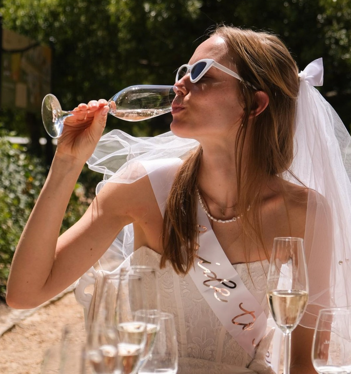 Rose gold lettered white sash reading C'est La Vie