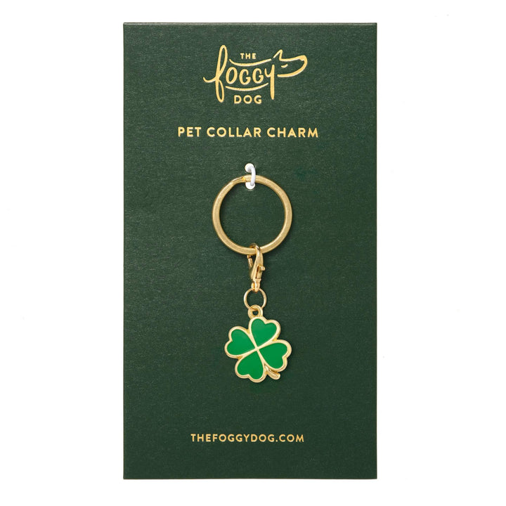Lucky clover charm shown on its backing card