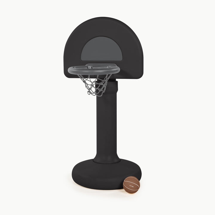 Raven black toddler basketball hoop with a small brown basketball at its base