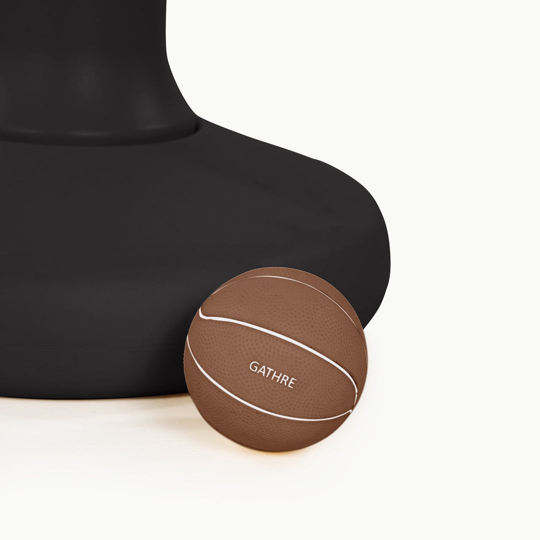 Detail of the raven black weighted base with a brown Gathre basketball