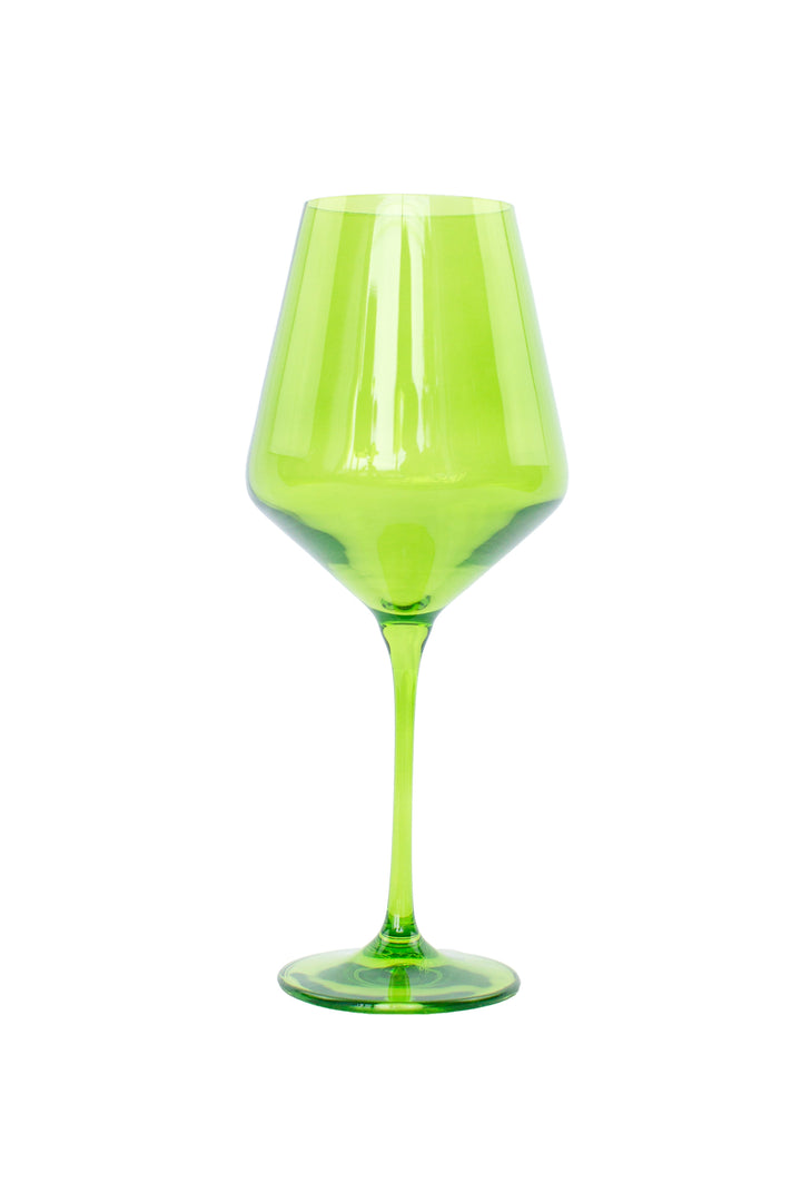 Green wine glass on a white background