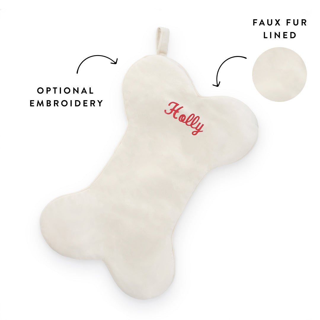 Ivory dog stocking callout showing optional embroidery and the cream faux fur lining