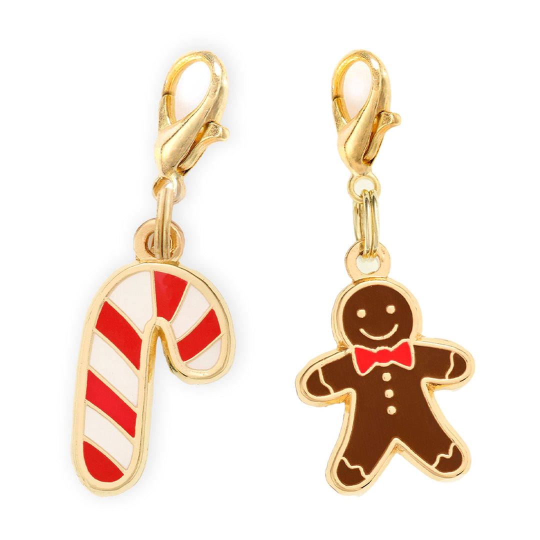 Sugar and Spice collar charm pair: a red-and-white candy cane and smiling gingerbread man with red bow tie and gold clasps.