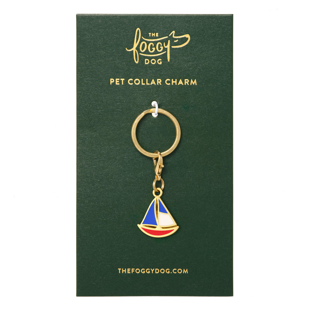 Sailboat charm shown on its backing card
