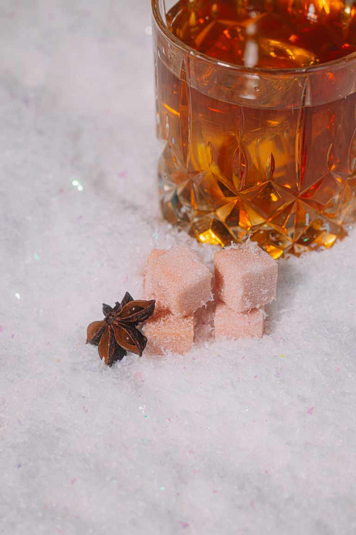 Spiced holiday bourbon cocktail made from a mixer cube