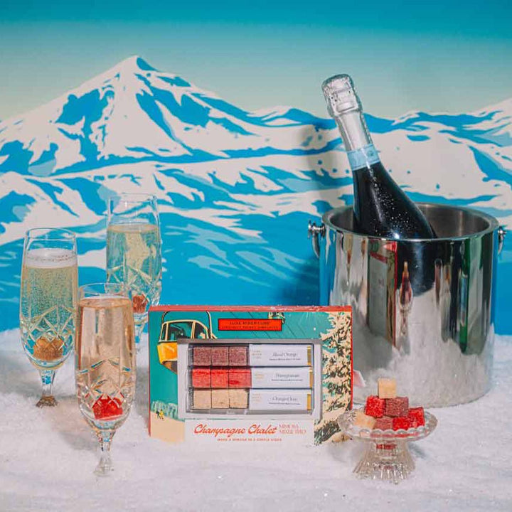 Festive champagne cocktail made with a winter mixer cube