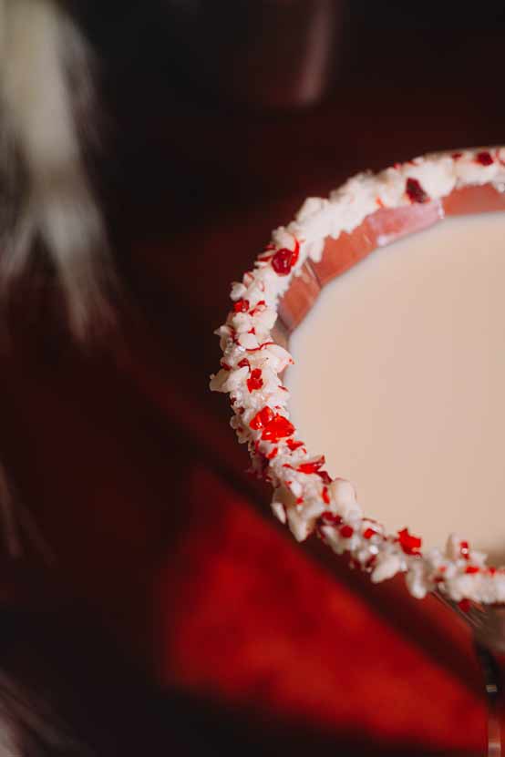 Festive white chocolate peppermint martini made with mixer cubes