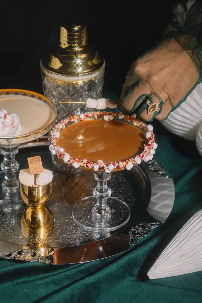 Dessert-style chocolate martini garnished with peppermint marshmallows