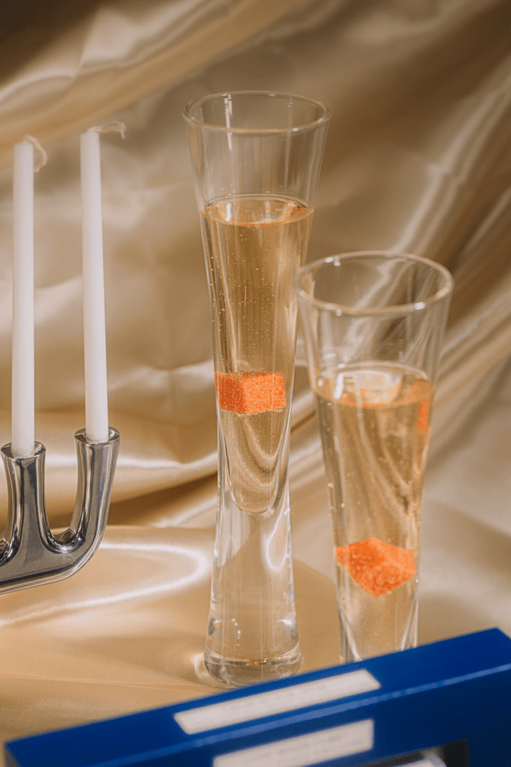Festive shimmer mimosa styled for a Hanukkah toast
