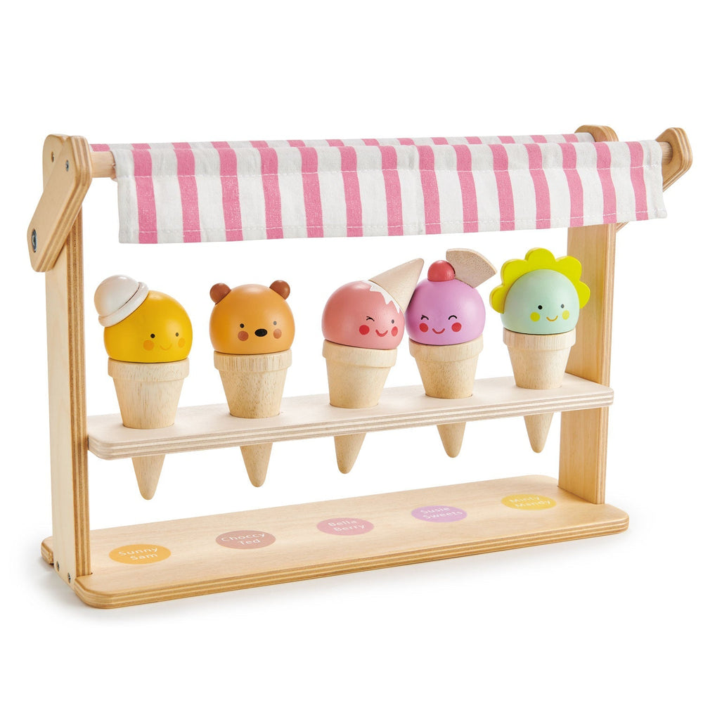 Second studio angle of the ice cream stand with bear, flower, and pastel cone scoops on white