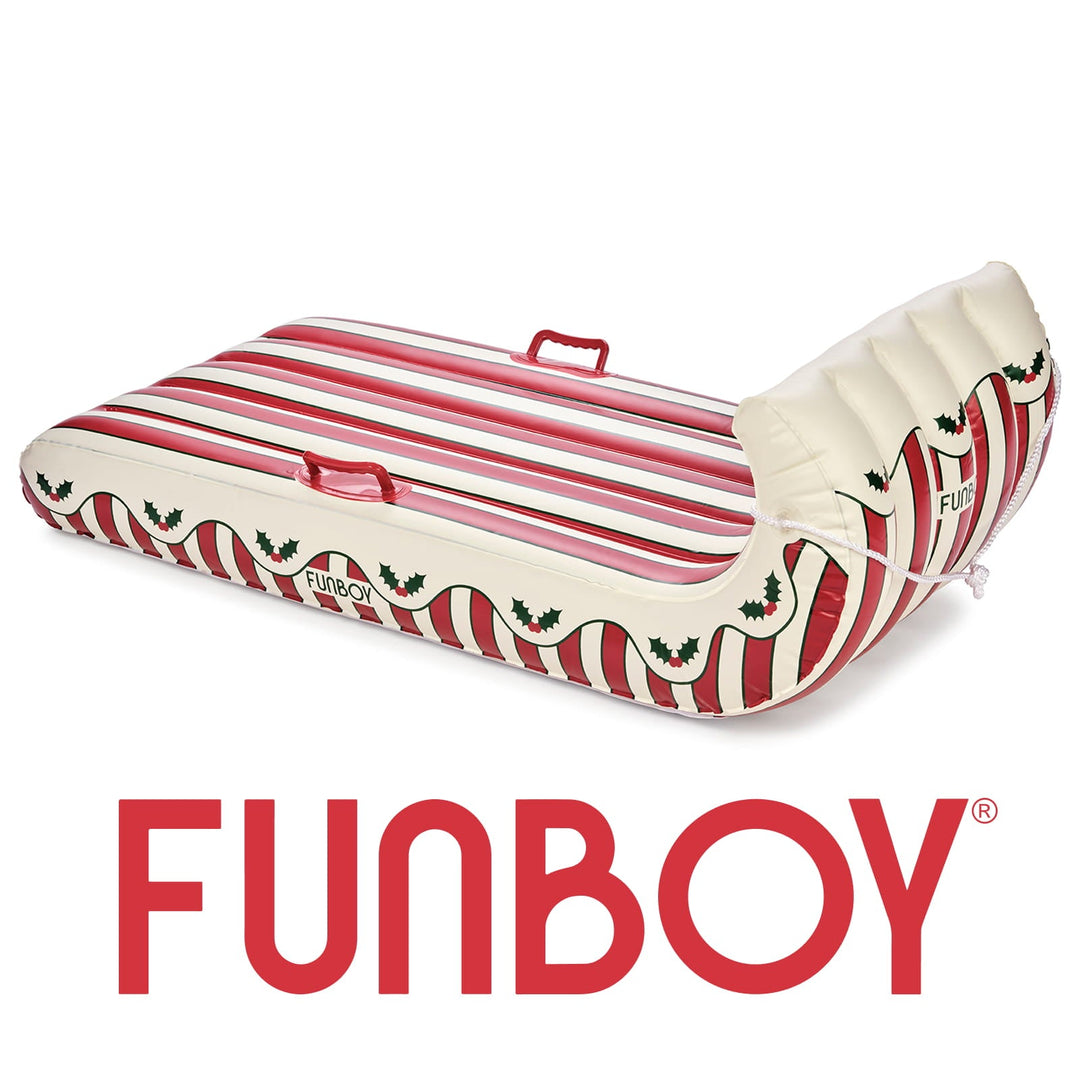 Holly stripe inflatable toboggan sled on white