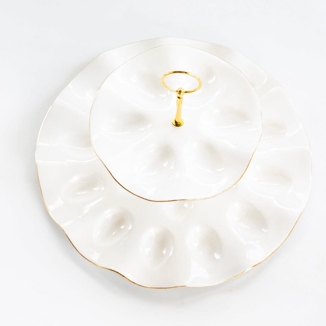 Top view of the tiered egg platter showing both rings of egg wells and the gold edges