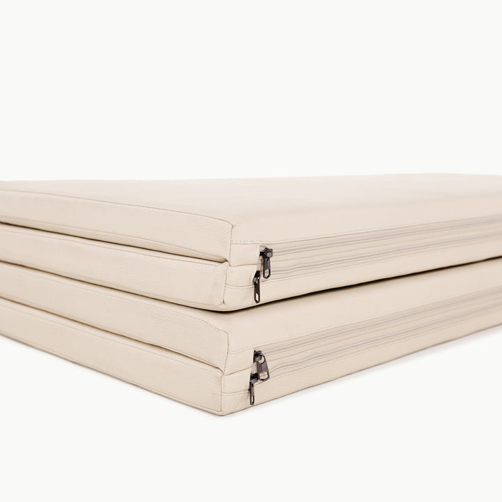 Side view of the Gathre tumbling mat showing its cushioned foam interior.