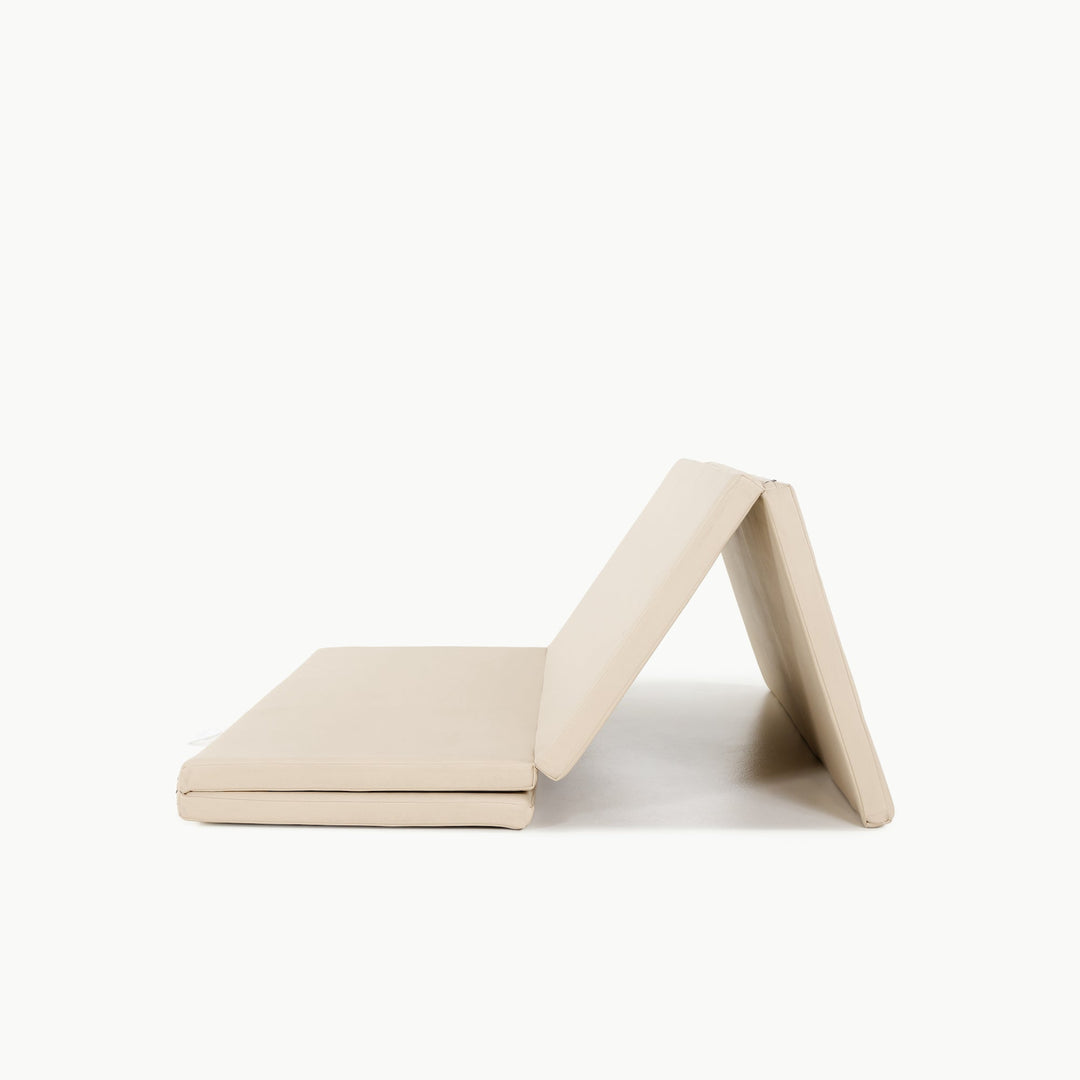 Gathre tumbling mat partially folded to show its sewn sections.