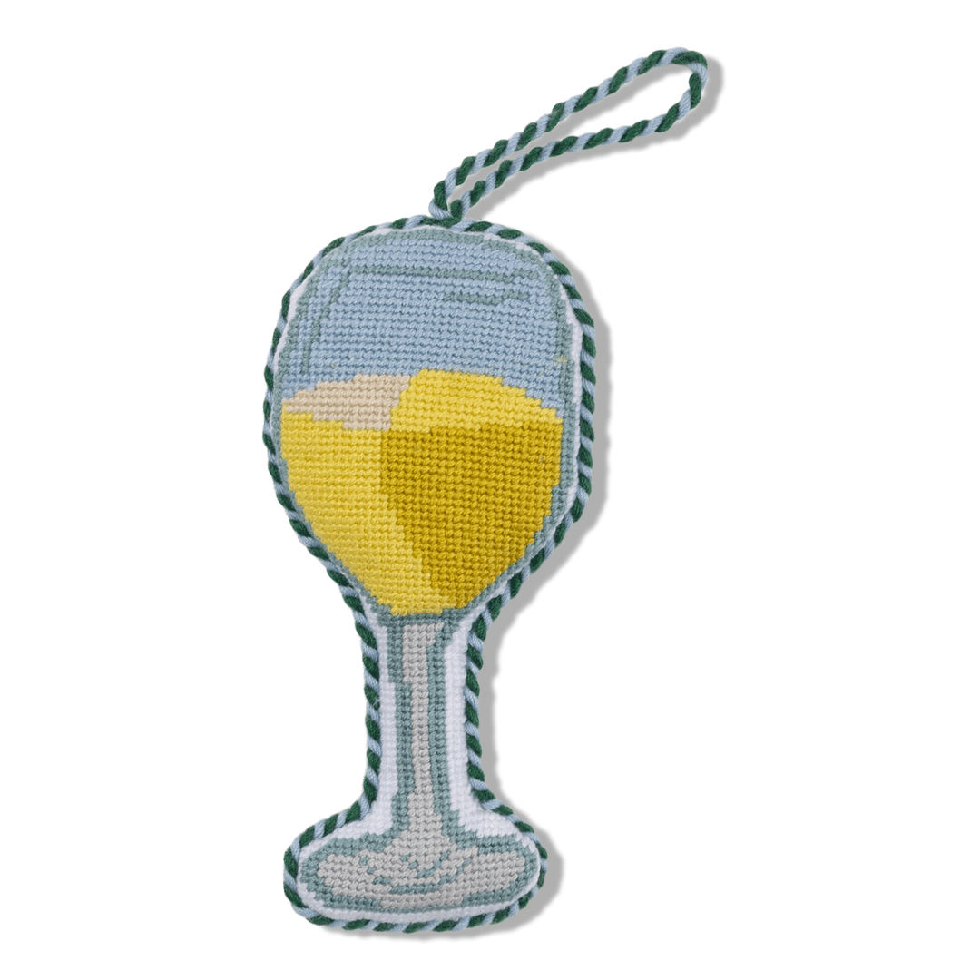 White wine glass needlepoint ornament, front view with pale yellow wine and teal and white cord