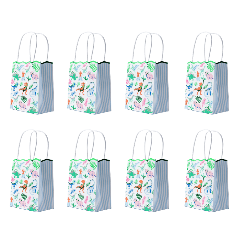 Eight dinosaur party favor bags with white handles in two rows, dino and palm leaf print with blue striped sides