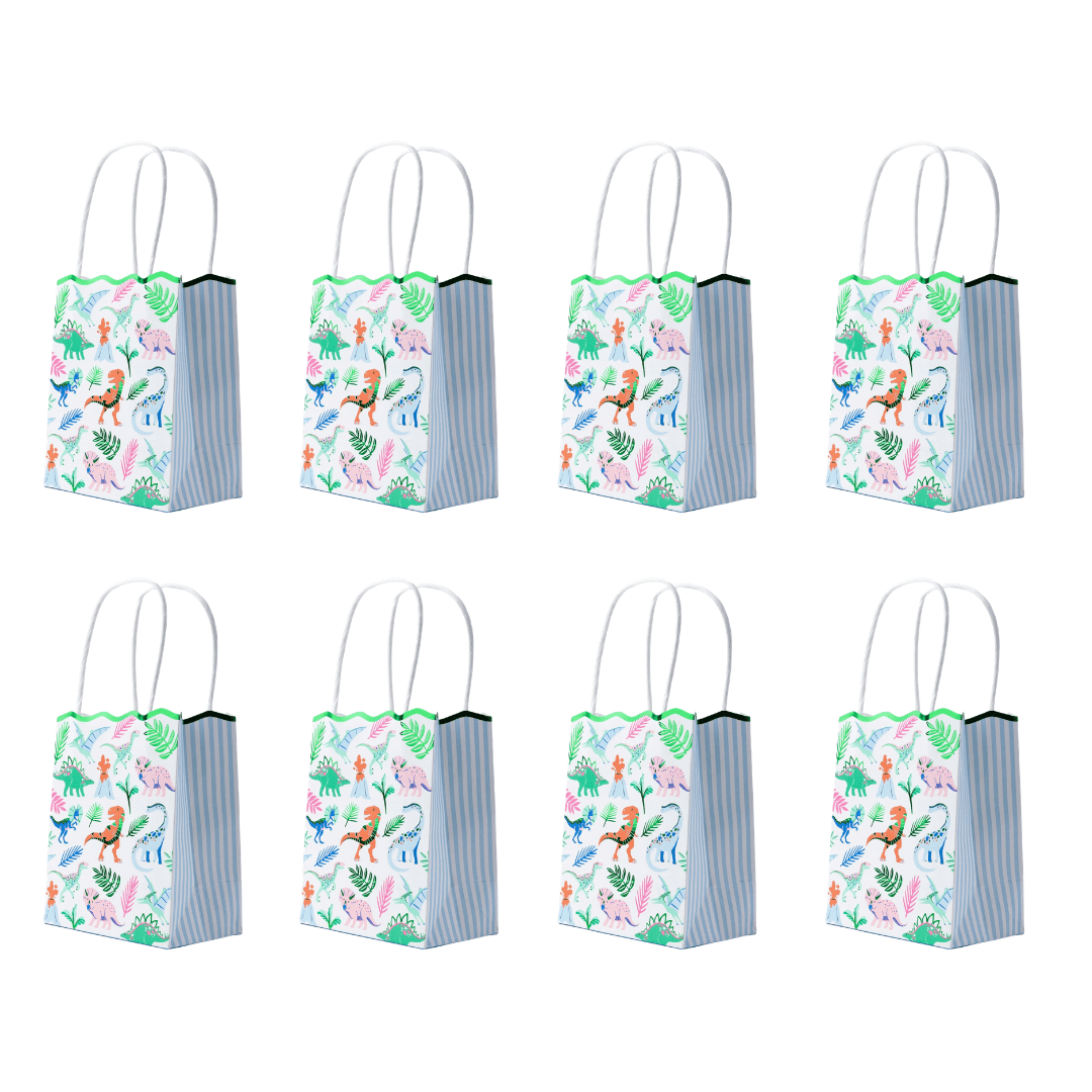 Eight dinosaur party favor bags with white handles in two rows, dino and palm leaf print with blue striped sides