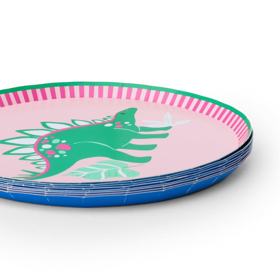 Stack of small dinosaur paper plates, a pink stegosaurus plate on top with a pink striped rim and blue underside