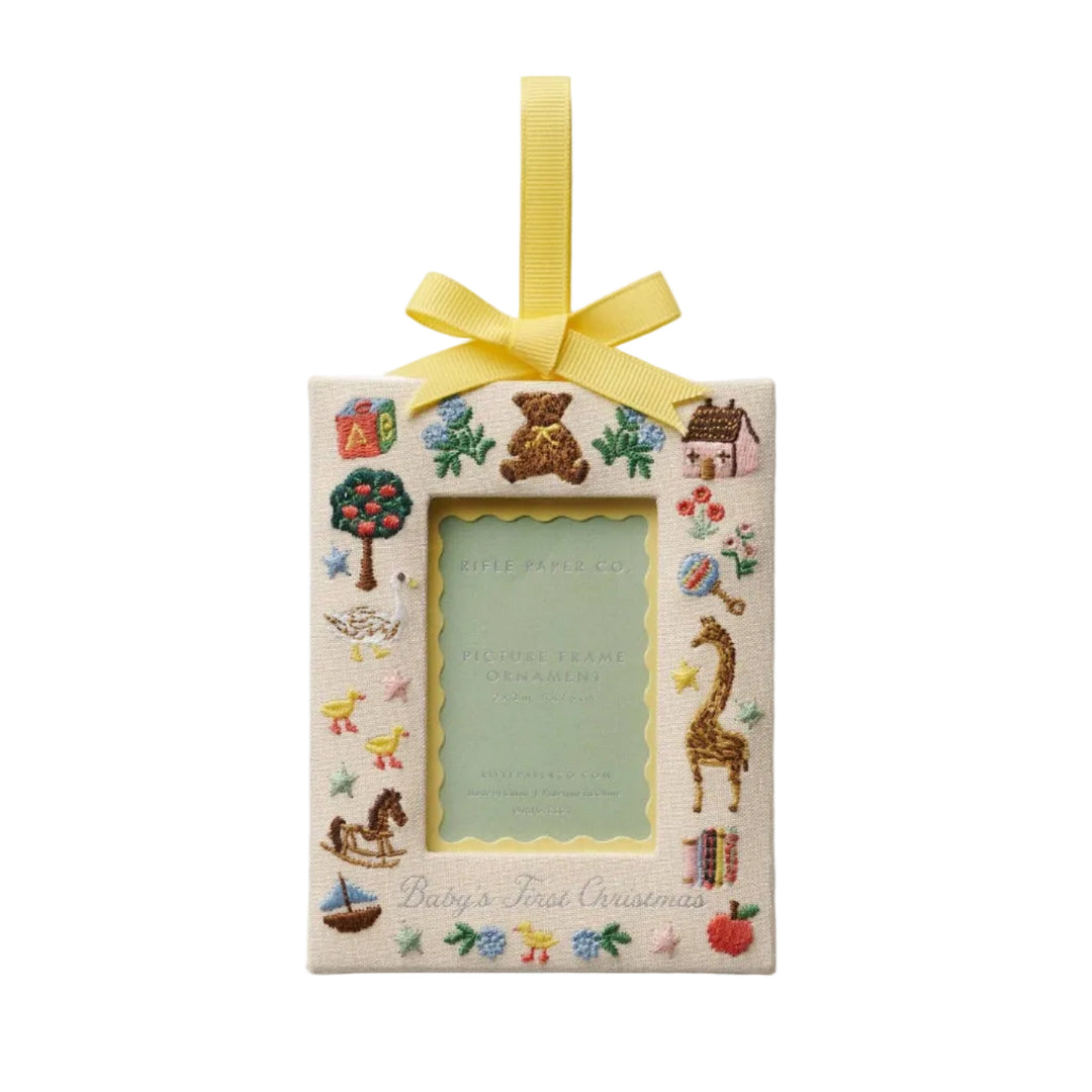 Baby's First Christmas bookcloth frame ornament with pastel nursery embroidery and yellow grosgrain bow