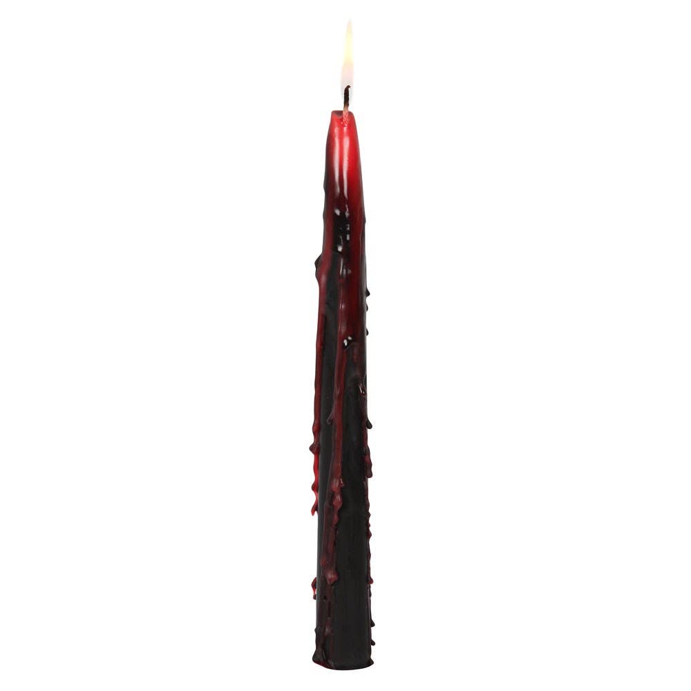 Single black taper candle dripping deep red wax like blood, a gothic glow for a spooky dinner table