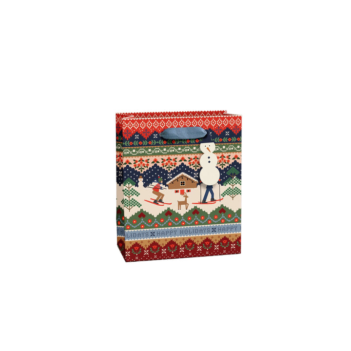 Ski Chalet gift bag in fair isle sweater print with skiers, cabin, and snowman gift tag with blue ribbon handles