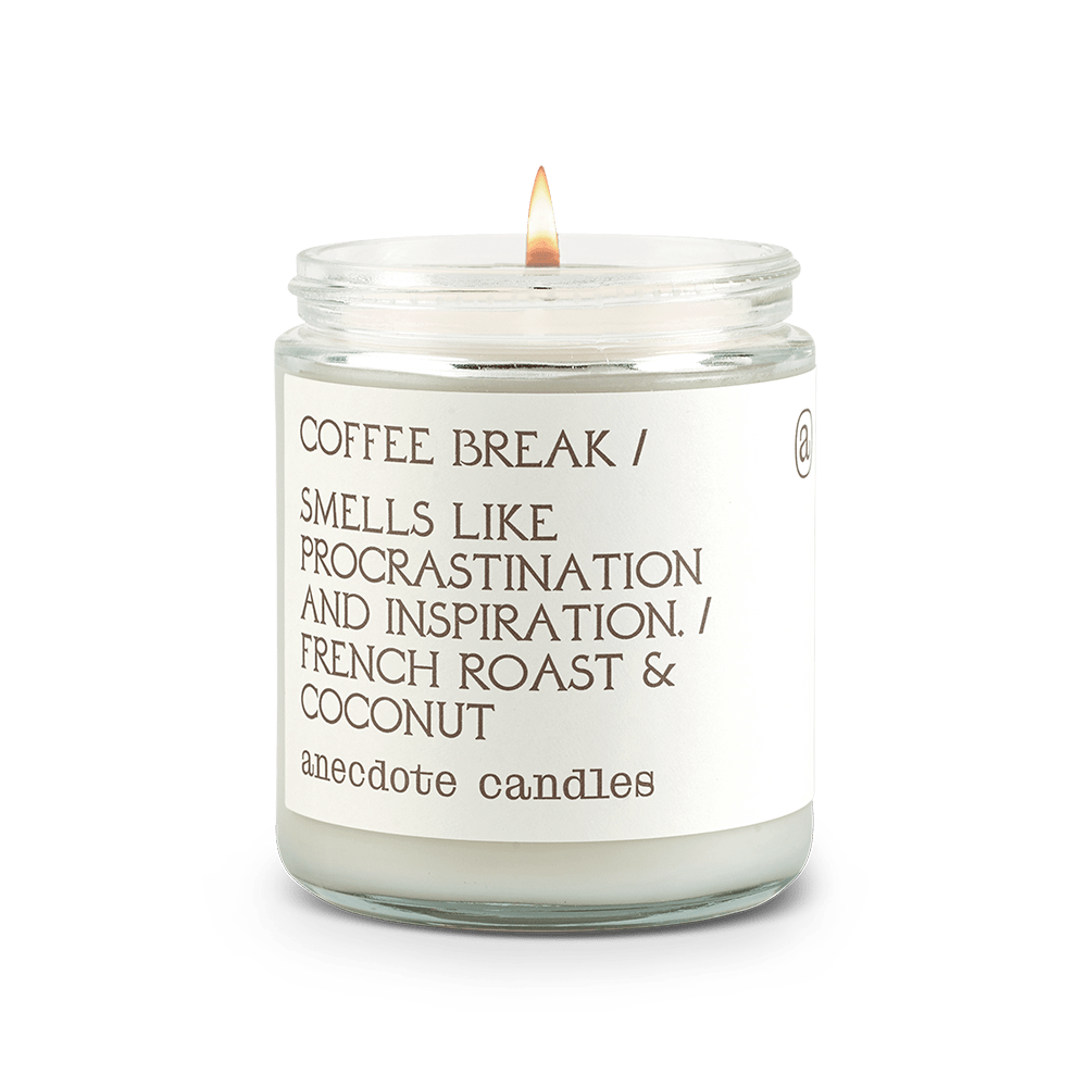 Lit Coffee Break glass jar candle with a white label reading French roast and coconut