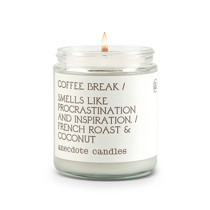 Lit Coffee Break glass jar candle with a white label reading French roast and coconut