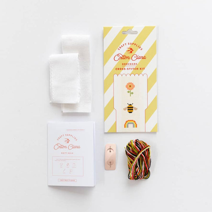 Bookmark cross stitch kit contents with aida strip, felt, needle, and thread