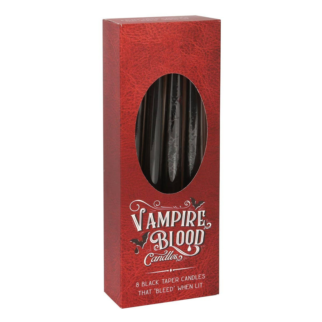 Red leather-look Vampire Blood box with a window of eight black tapers, a gothic Halloween host gift