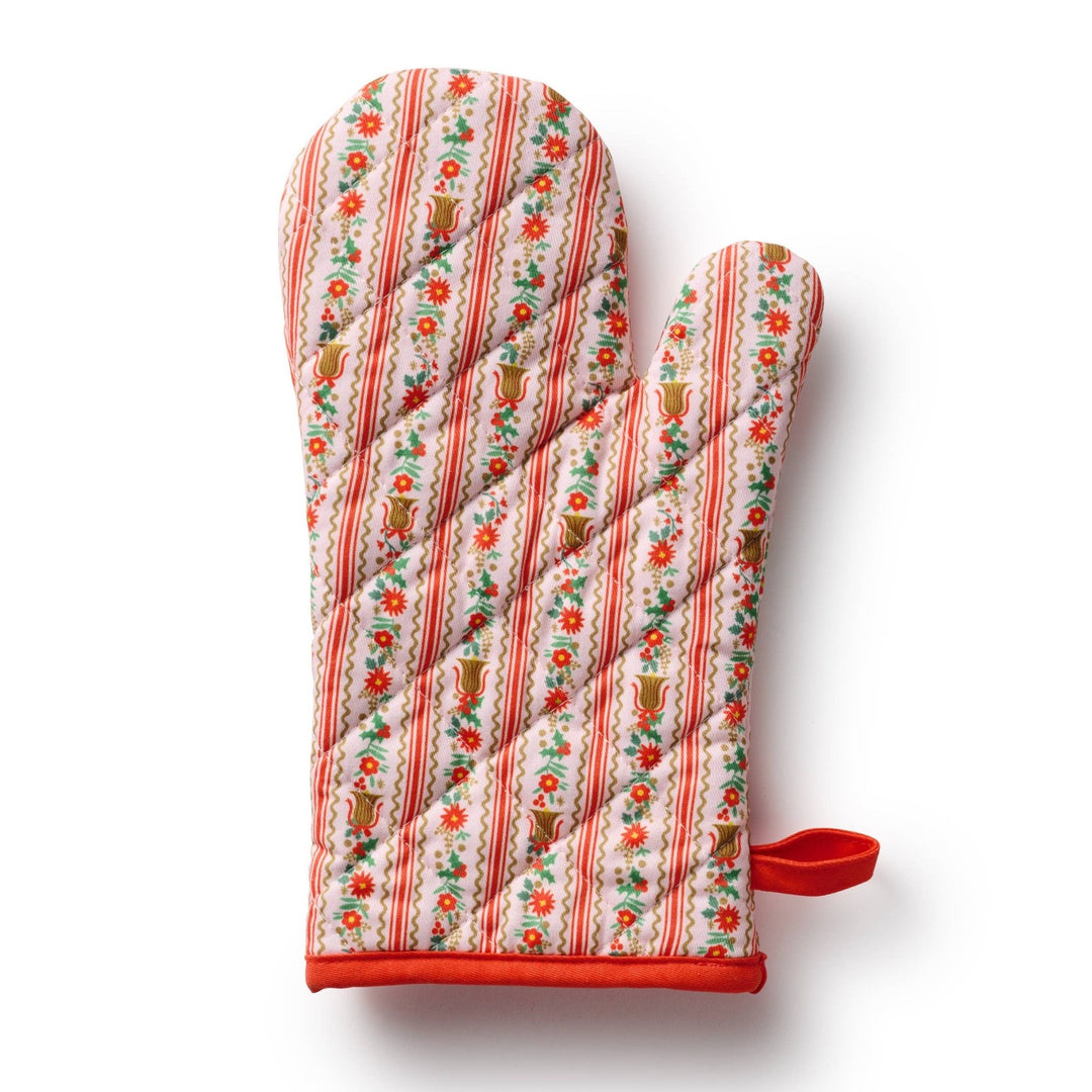 Quilted Holly Jolly oven mitt in floral stripe print with red trim and hanging loop for Christmas baking
