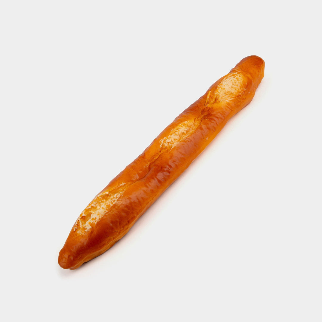 Buon Appetito baguette candle by 54Celsius, a bread shaped novelty candle for a French bistro themed dinner party
