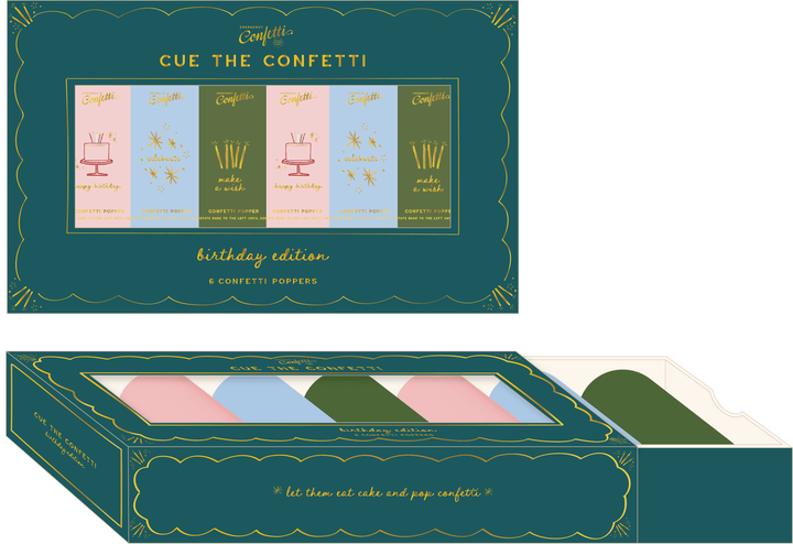 Flat lay of the green birthday box with six confetti poppers in pink, blue, green, and cream