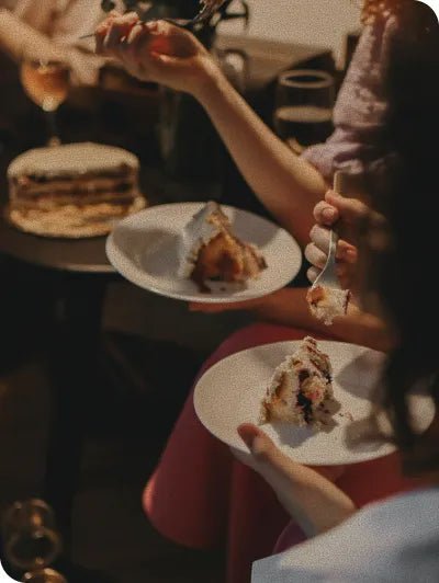 Layered birthday cake latte made with coffee mixer cubes