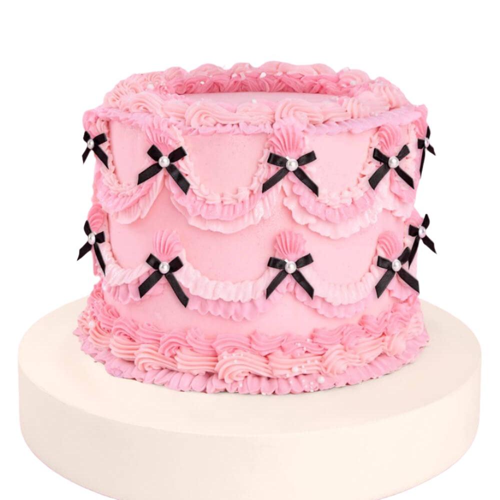 Black and pearl bow cake toppers for a bachelorette party or bridal shower, set of 12