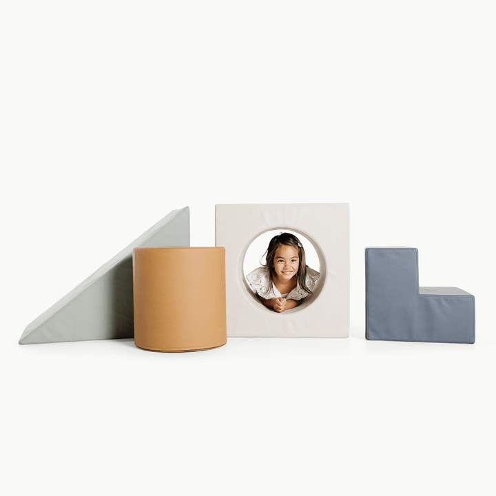 Gathre block playset with foam steps, a cube, and a triangle ramp in cream London print and rust