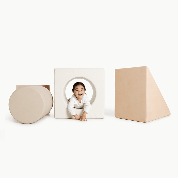 Gathre block playset with foam steps, a cube, and a triangle ramp in cream London print and rust