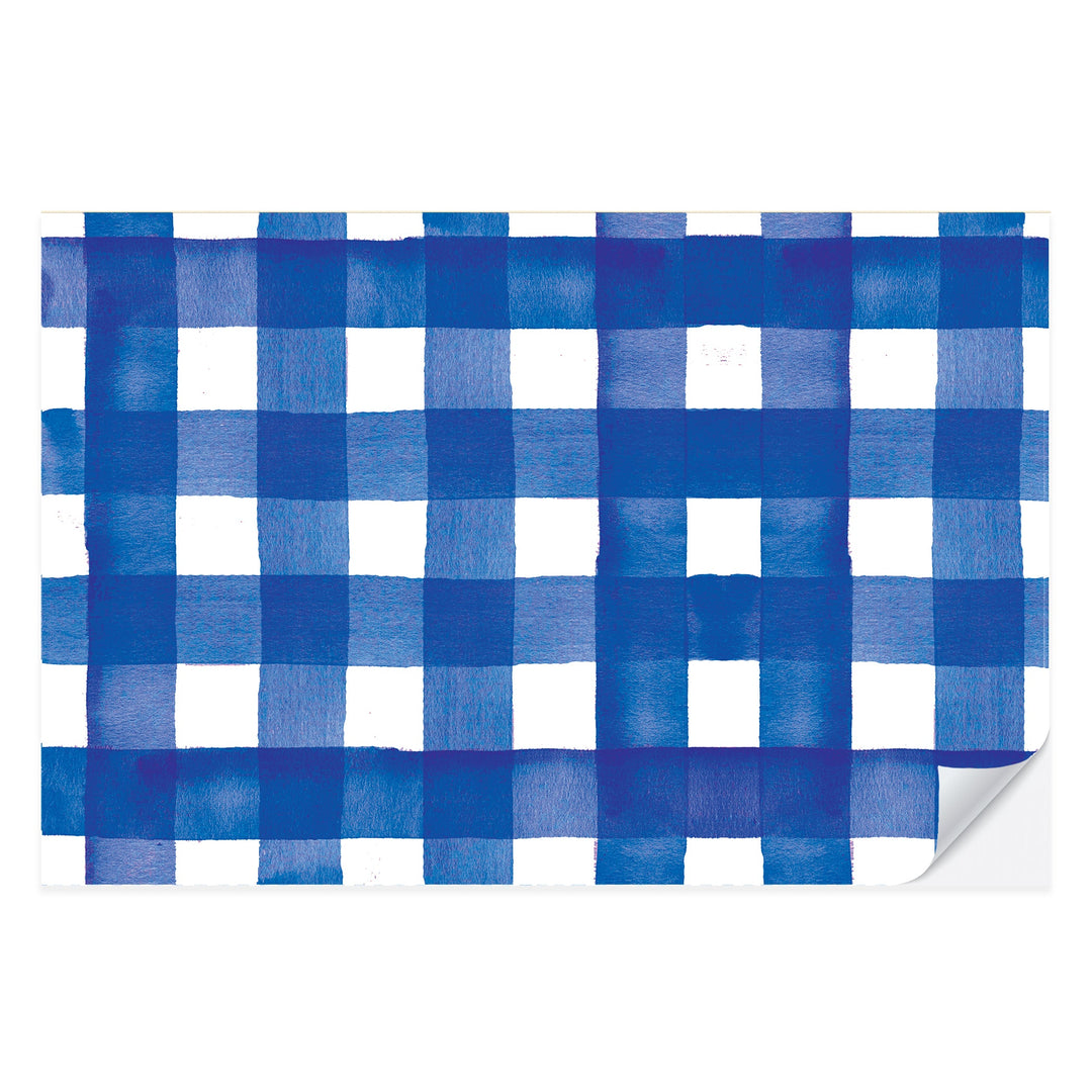 Blue and white watercolor gingham check paper placemat from a tear-off pad of 25