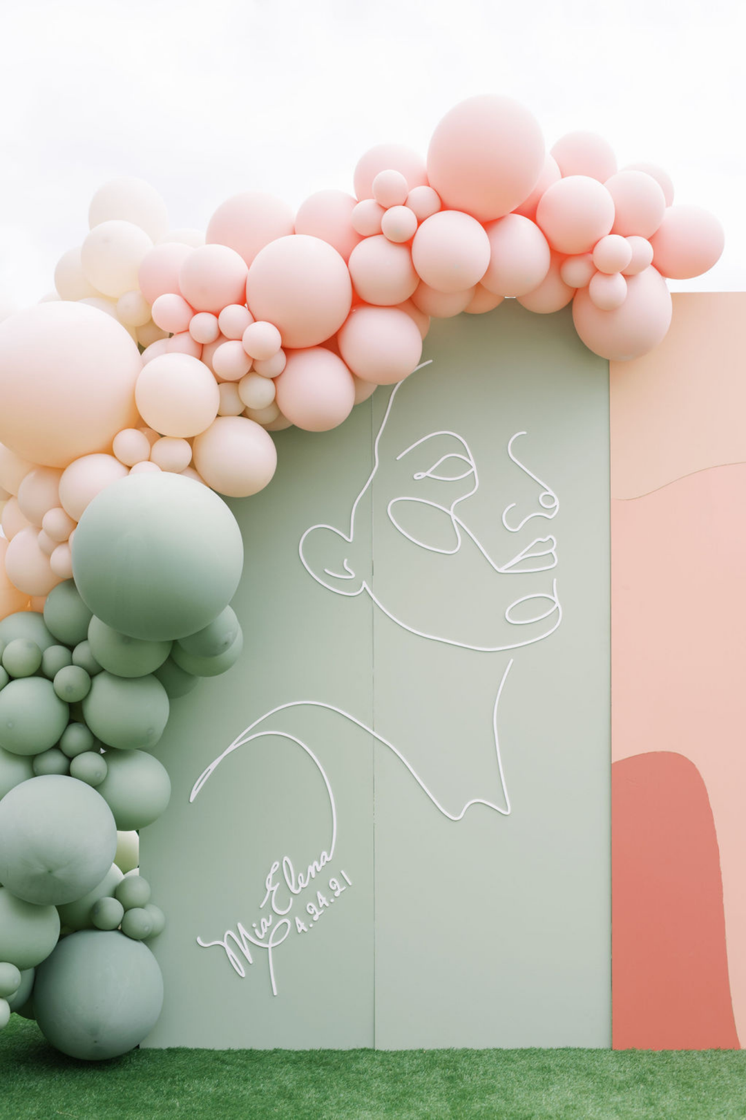 Pastel pink and green balloon garland neutral balloon decoration ideas - Los Angeles balloon installation