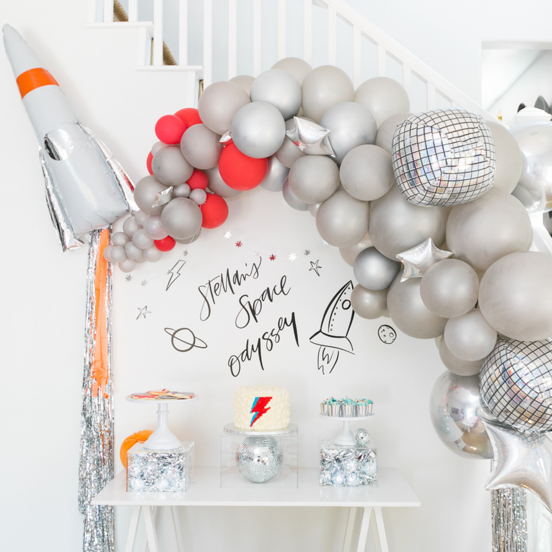Silver balloon garland with space theme party decorations Space party balloon decoration ideas - Los Angeles balloon installation