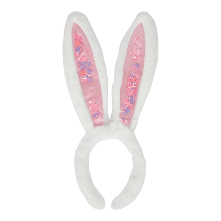 White plush bunny ears headband with pink confetti sealed inside the ears