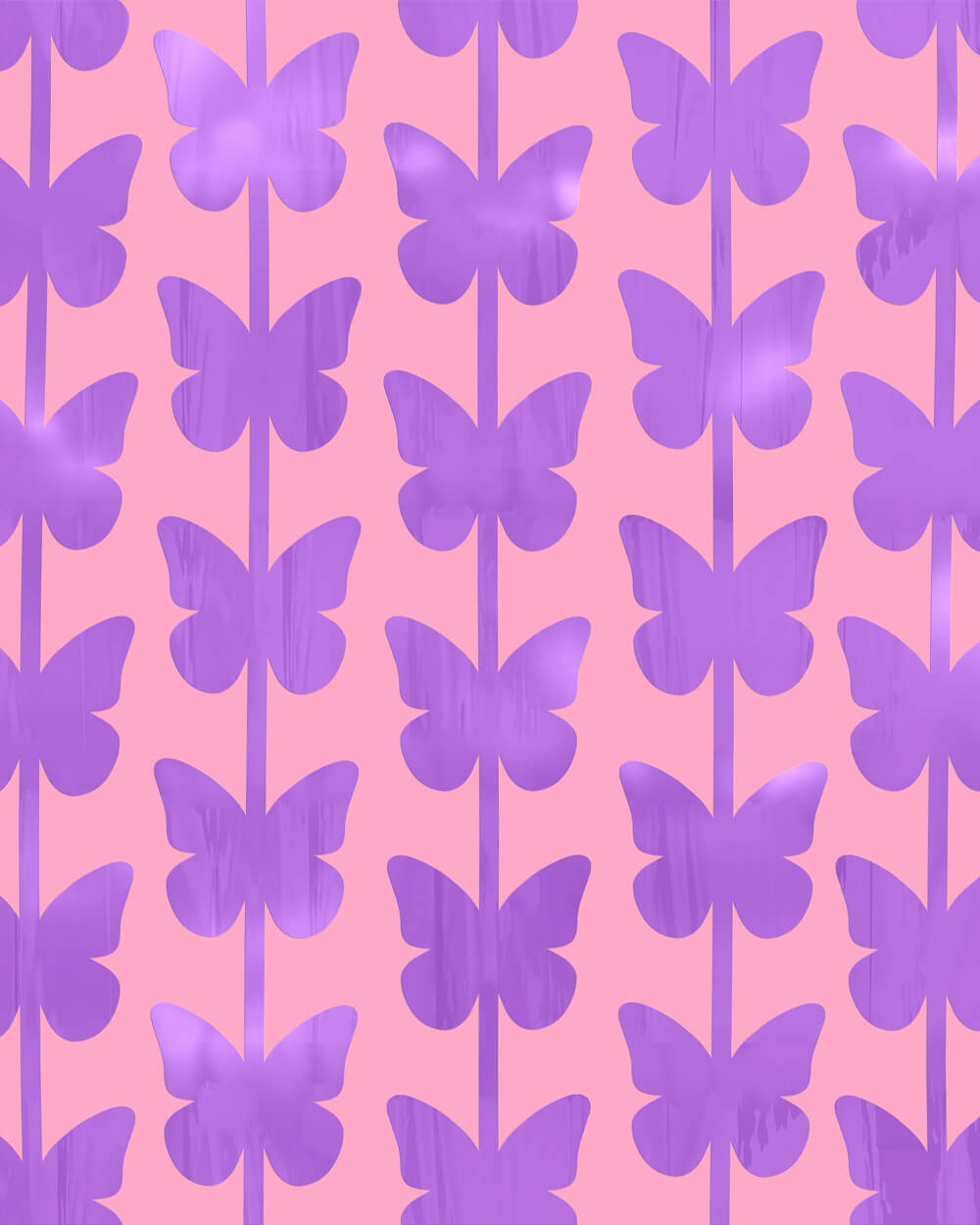 Purple butterfly foil curtain strands hung close together as a butterfly party backdrop