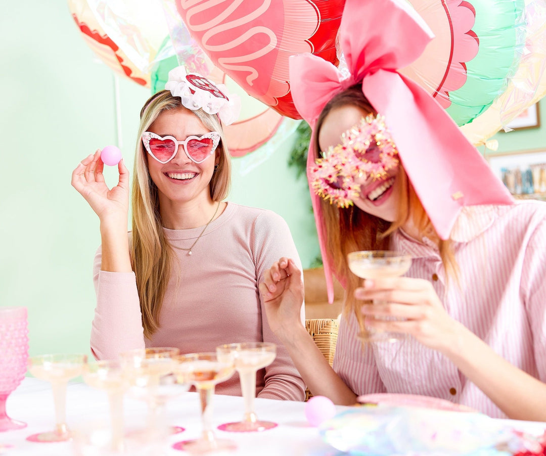 Pink champagne pong drinking game for bridal showers and bachelorettes