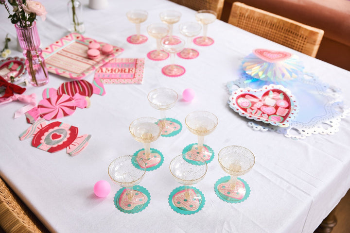 Champagne pong set with five ounce coupe glasses and four inch coasters