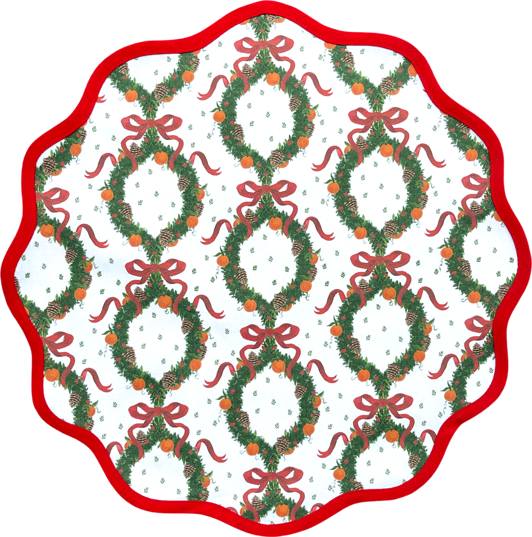 Round scalloped Christmas placemat in the Holiday Wreath print, Rosebud Red