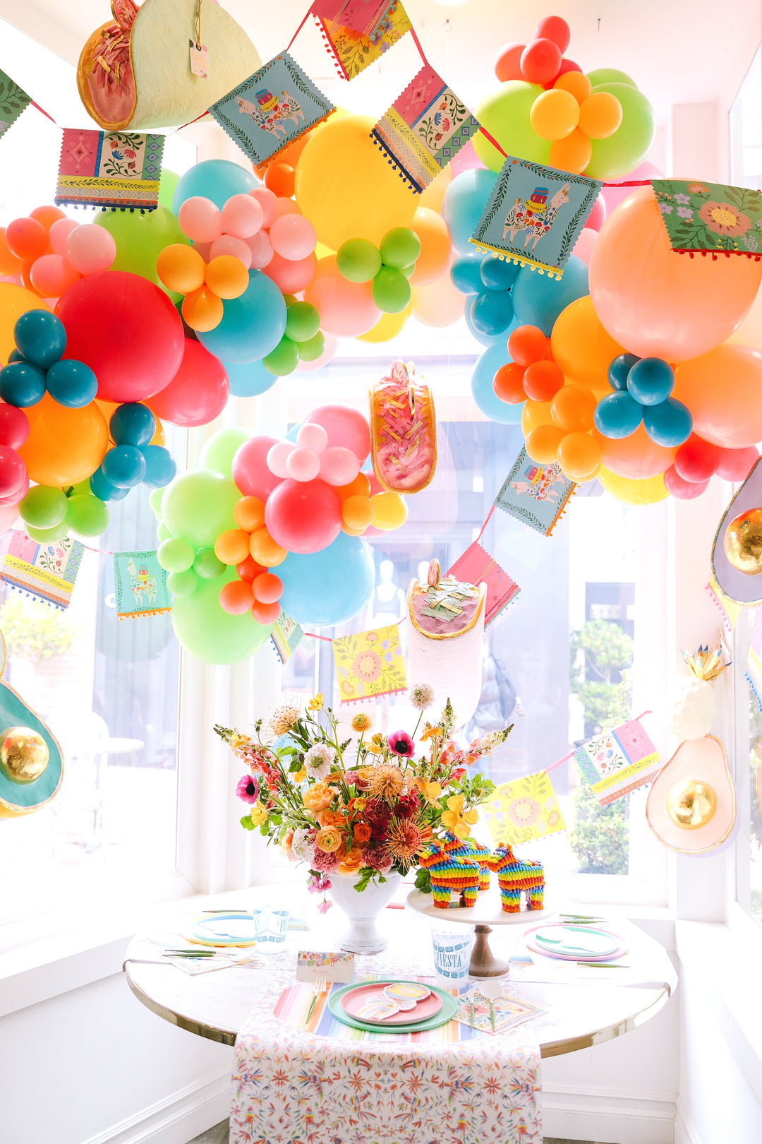 fiesta cinco de mayo colorful party supplies balloons papel picado pinata