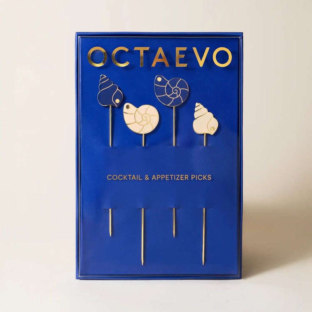 Pearl shell cocktail picks by 54Celsius, a set of four gold plated picks for appetizers or a coastal themed cocktail party